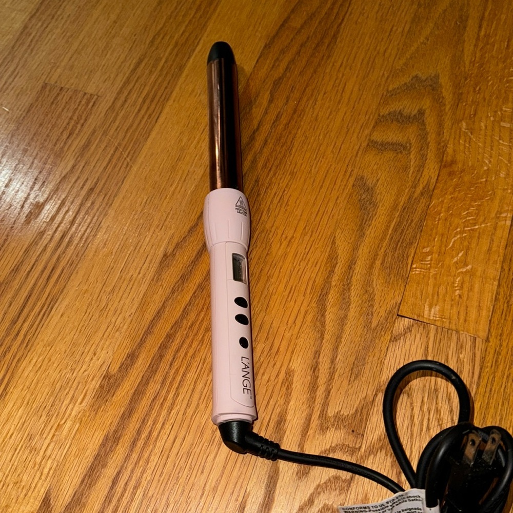 Pink curling iron